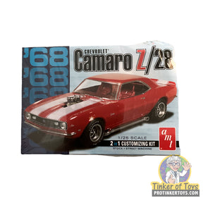 Red 1/25 scale model kit box art for a 1968 Chevy Camaro Z/28 for AMT AMT868D