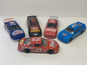 Assortment of die-cast race cars in various colors and liveries for Racing Champions 5/ea