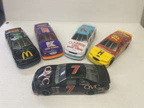 Collection of die-cast NASCAR race cars in various colors and liveries for Racing Champions 5/ea