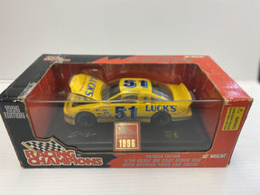 Yellow die-cast race car, Luck's #51, in its opened box for Racing Champions 09040