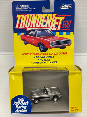 Red and silver slot cars in open display box for play for Pull Back Thunderjets 393-01