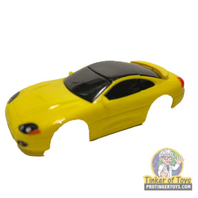Yellow toy car, 1994 Dodge Stealth model for Tyco B9141, rear view