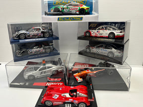 Assortment of die-cast race cars in various colors and models for TInkerbundle