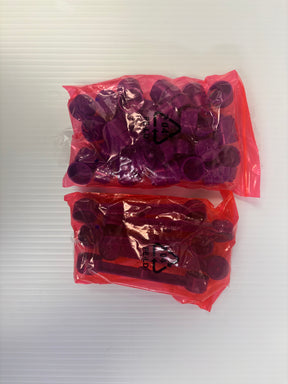 Two small, clear bags containing purple and red plastic flags for Auto World TRX101-P