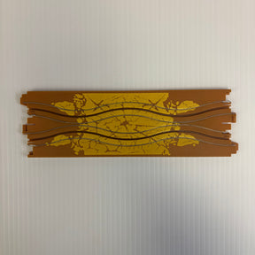 Dirt track section with two parallel, curved train tracks for Auto World H001-D