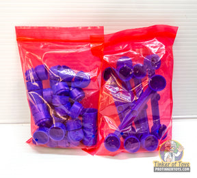 Purple and blue support and flag pieces in clear plastic bags for Auto World TRX101-B
