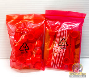 Red plastic support and flag pieces in clear bags for Auto World TRX101-R
