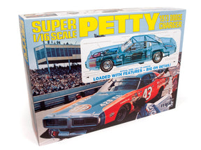 Box art for a 1/16 scale model kit of a 1973 Dodge Charger driven by Richard Petty for MPC MPC938