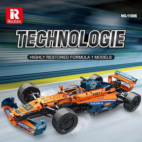 Orange and blue 1/8 scale RC McLaren F1 race car model kit for Reobrix REO11006, front view