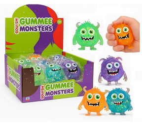 Assortment of colorful, squishy monster toys in their box packaging for Handee HA4009
