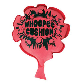 Red cushion with "WHOOPEE CUSHION" text, designed for seating support for Schylling WHC