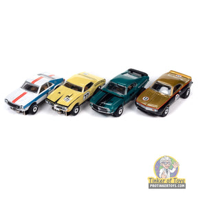 Four slot car rally cars: white, yellow, teal, and gold for Auto World SRS348