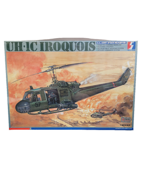 Model kit box art: UH-1C Iroquois helicopter in action for Semina Models 9002