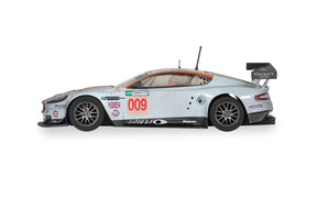 Silver Aston Martin DBR9 race car with Gulf livery and number 009 for Scalextric C4316