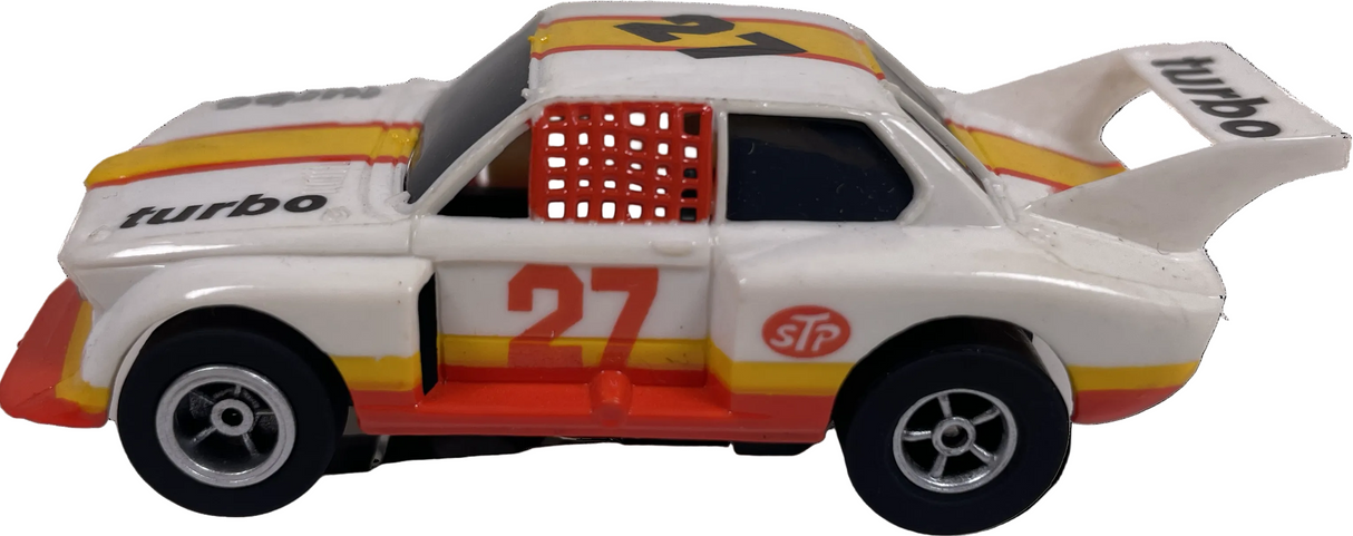 White, yellow, and orange toy car replica of a BMW Beamer with number 27 for Tomy-Afx B8772