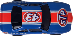 Blue toy race car with red and white "43" and "STP" decals for Tyco B25003