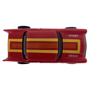 Red toy car replica of a 1957 Chevy Hardtop with "454CID" lettering for Tyco B6977