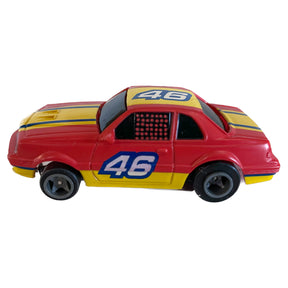Red and yellow NASCAR race car toy with "46" on the side for Life-Like 13017B