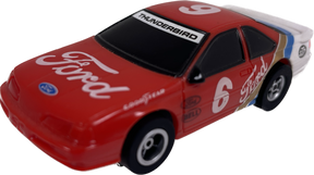 Red Ford Thunderbird slot car with "Thunderbird" and "Ford" visible for Tomy-Afx B8700