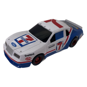 White Ford Thunderbird toy car with red and blue racing decals for Tyco B6922