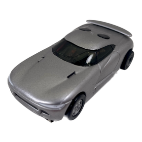 Silver toy car, Dodge Defender model, viewed from the front angle for Tyco B31000