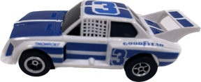 White and blue slot car with "Goodyear" and "3" markings for Tomy-Afx B8773