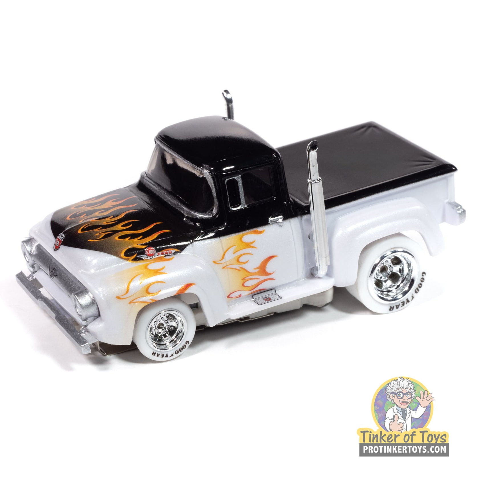 Black and white 1956 Ford F100 pickup toy truck with orange flames for Auto World SC413
