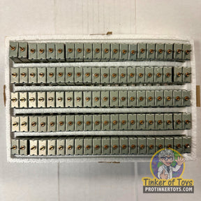 Assortment of small, metal electrical connectors in a box for Tyco 6576