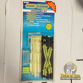 Accessory kit for electric racing, including guardrails, flags, and signs for Tyco 6794