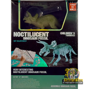 Dinosaur fossil assembly kit showing a glow figure and a mounted fossil for King Me World IMX17222