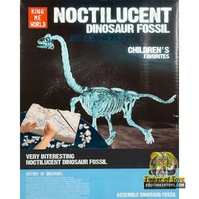 Dinosaur fossil assembly kit showing a large, light blue Brachiosaurus skeleton for King Me World IMX17217