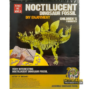 Dinosaur fossil assembly kit showing a Stegosaurus skeleton for kids for King Me World IMX17218