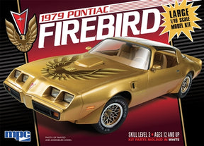 Gold 1979 Pontiac Firebird model kit assembled, showing front and side view for MPC MPC862