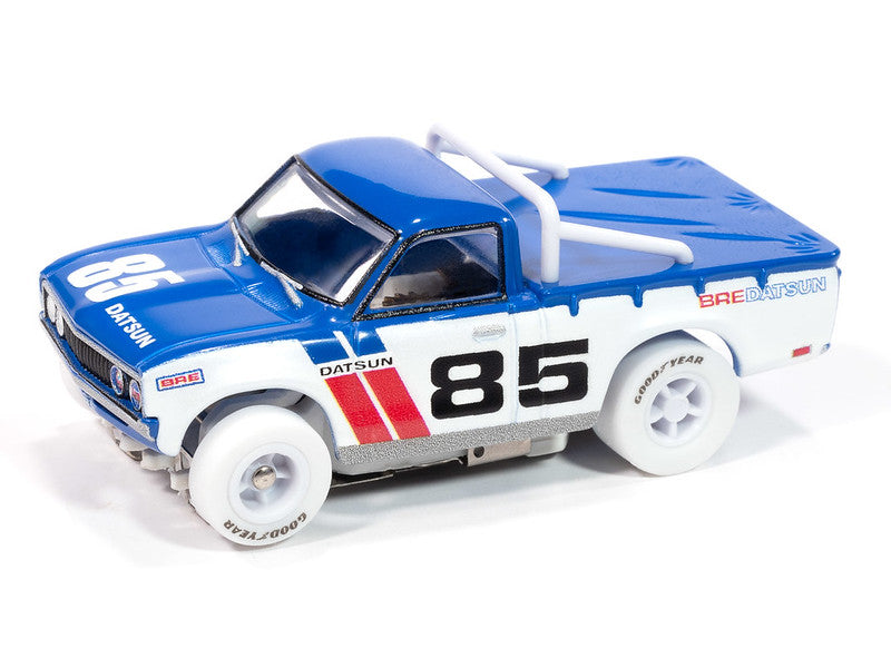Blue and white slot car of a 1972 BRE Datsun 620 pickup truck for Auto World SC420