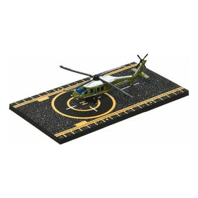 BlackHawk helicopter model on a landing pad display base for HotWings 14147