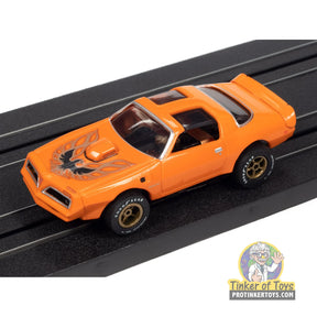 1977 Pontiac Firebird (Orange) 5B | SC354 | Auto World — on-track view