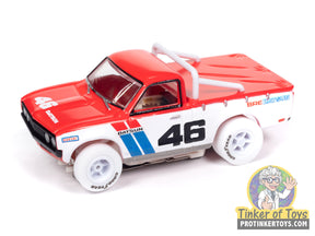 Red and white slot car with "Datsun" and "46" markings for Auto World SC404