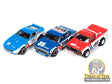 Three slot car race cars: blue, blue/white, and red for Auto World SC404