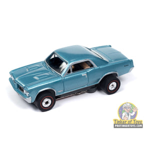 Blue slot car, side view, on white background for Auto World SC406
