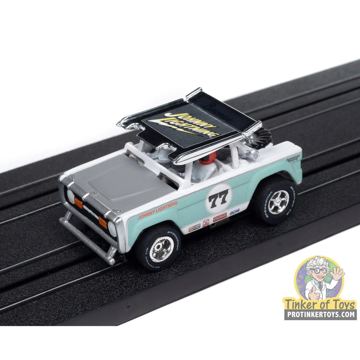 Xtraction 1972 Ford Baja Bronco (White with Light Teal Race Graphics) 1B | SC407 | Auto World — on-track view