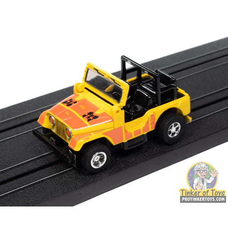 Xtraction 1979 Jeep CJ-7 (Yellow with Orange 4x4 Graphics) 2A | SC407 | Auto World — on-track view