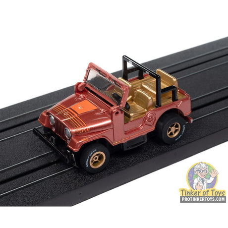 Xtraction 1979 Jeep CJ-7 (Russet Red Poly with Orange Renegade Graphics) 2B | SC407 | Auto World — on-track view
