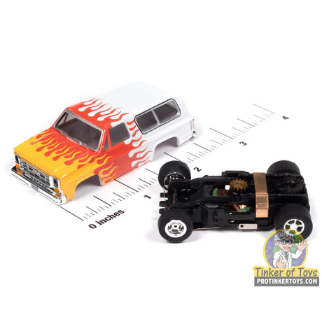 Xtraction 1979 Chevy Blazer (White with Yellow & Red Flames) 3A | SC407 | Auto World — chassis and scale view