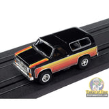 Xtraction 1979 Chevy Blazer (Black with Red & Yellow Side Panels) 3B | SC407 | Auto World — on-track view