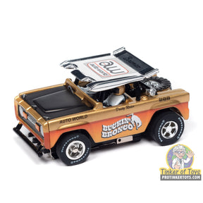 Toy slot car of a dusty rider off-road vehicle for Auto World SC407