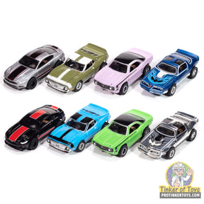 Eight unopened slot cars: black, silver, green, pink, blue, black, blue, green for Auto World SC410