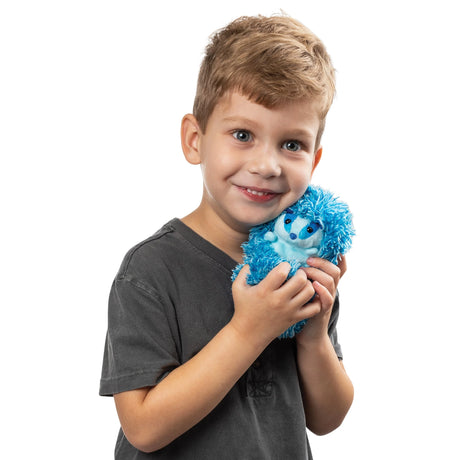 Boy hugging Curlimals Blue Badger