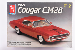Red 1969 Cougar CJ428 model kit box art for AMT