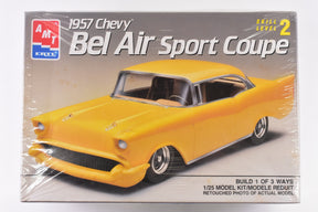 Yellow 1957 Chevy Bel Air Sport Coupe model kit box art for AMT 6563