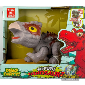 Gray ankylosaurus toy with yellow eyes next to a red dinosaur toy for King Me World IMX17206